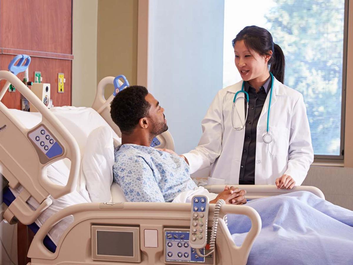 Patient talking to doctor.